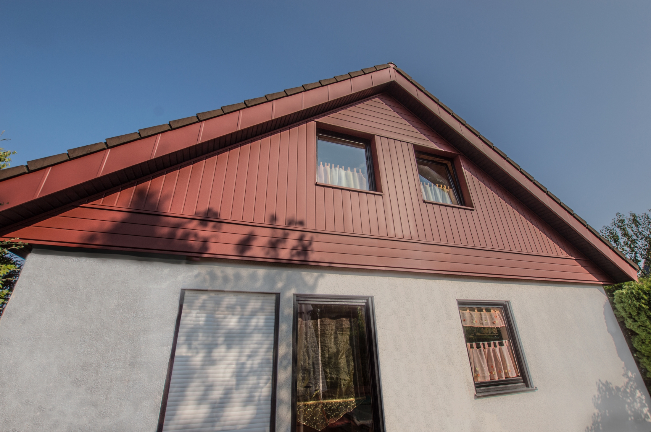 Referenčni objekti PREFA Fasadni sistemi Siding 05 P.10 oksidno rdeča